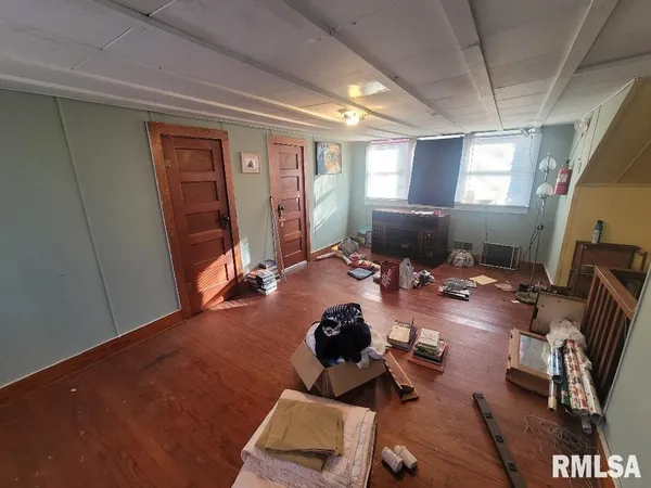 a room with furniture and a window