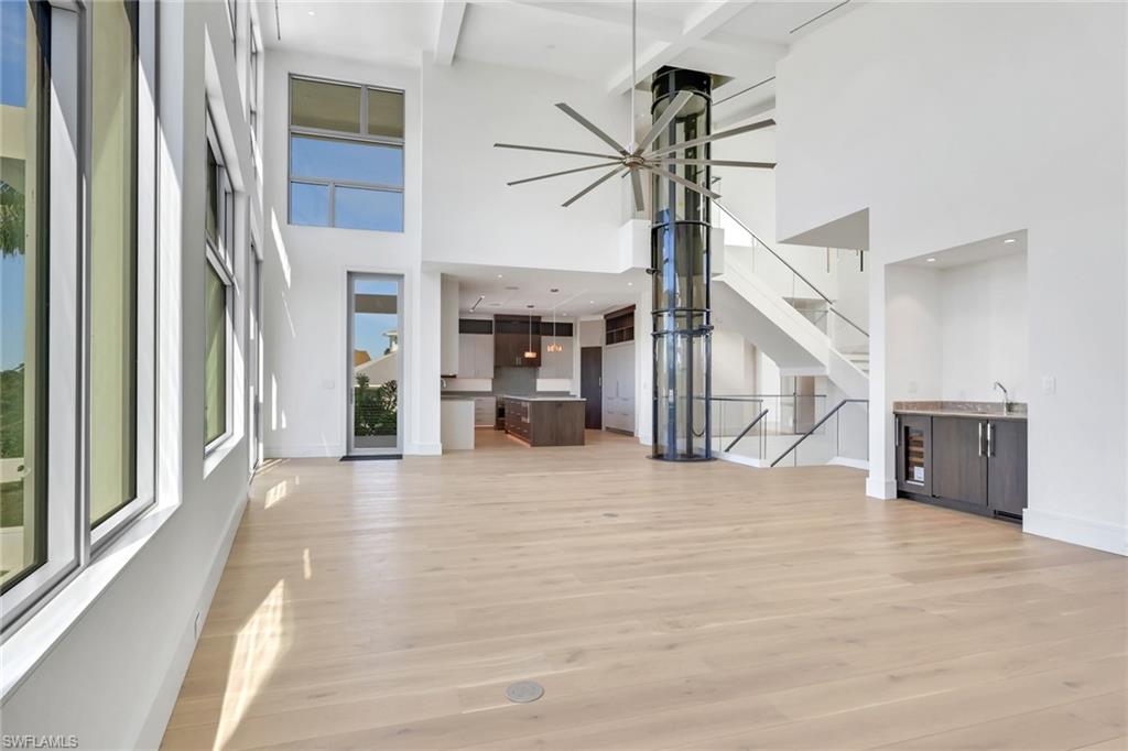 1798 Holiday Lane Naples, FL 34104 - Photo 8 of 31 a view of an entryway with wooden floor