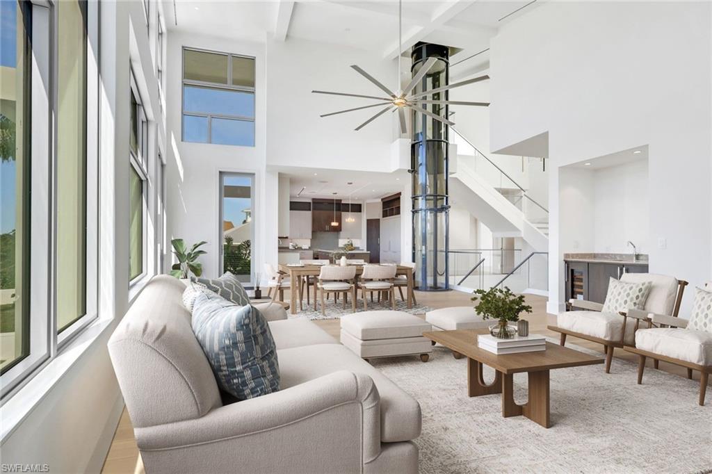 1798 Holiday Lane Naples, FL 34104 - Photo 9 of 31 a living room with furniture