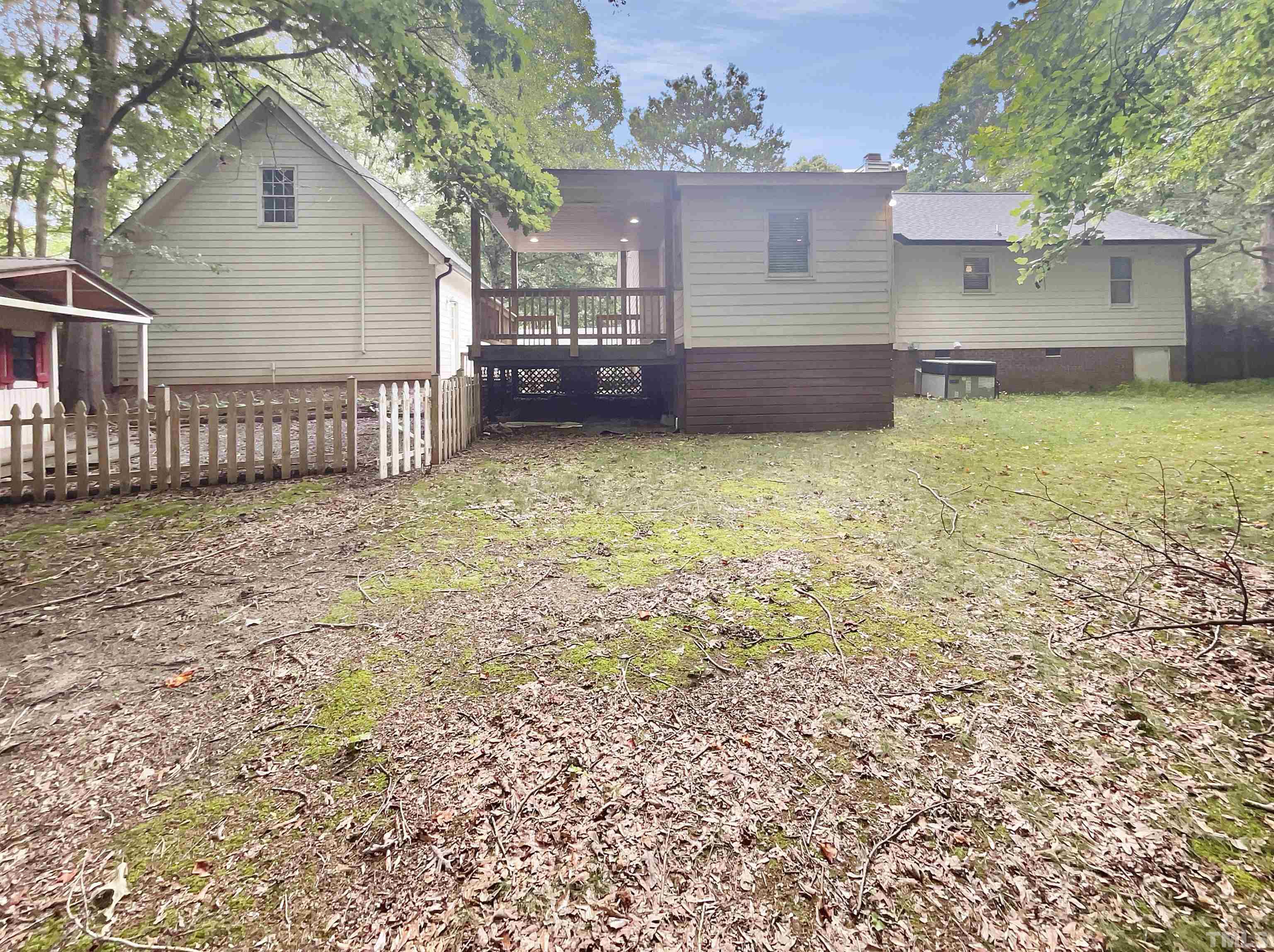 2025 Canterbury Road Clayton, NC 27520 - Photo 7 of 18 a view of a backyard