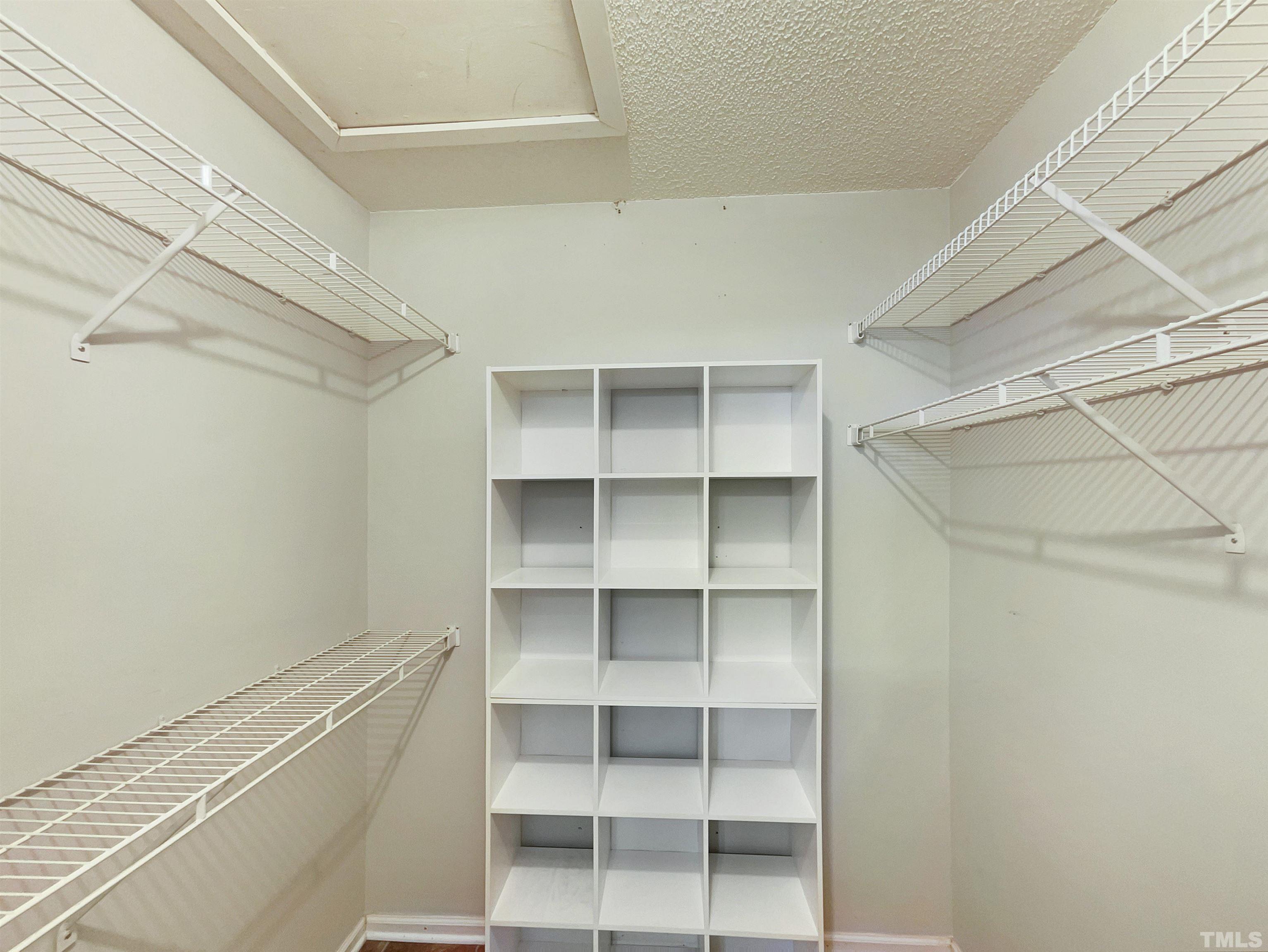 2025 Canterbury Road Clayton, NC 27520 - Photo 9 of 18 a view of room with empty racks