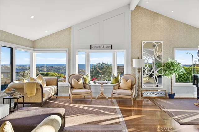 a large kitchen with stainless steel appliances granite countertop a lot of counter space and a sink