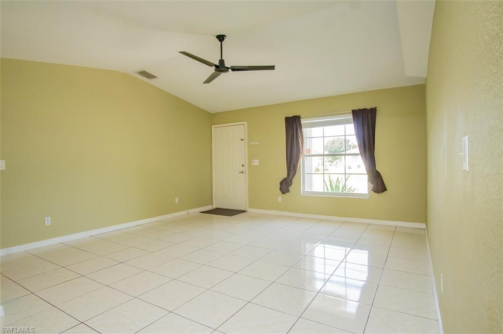 19011 Coconut Road Fort Myers, FL 33967 - Photo 5 of 16 a view of an empty room with a window