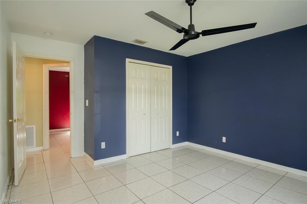 19011 Coconut Road Fort Myers, FL 33967 - Photo 6 of 16 a view of a livingroom with a chandelier fan