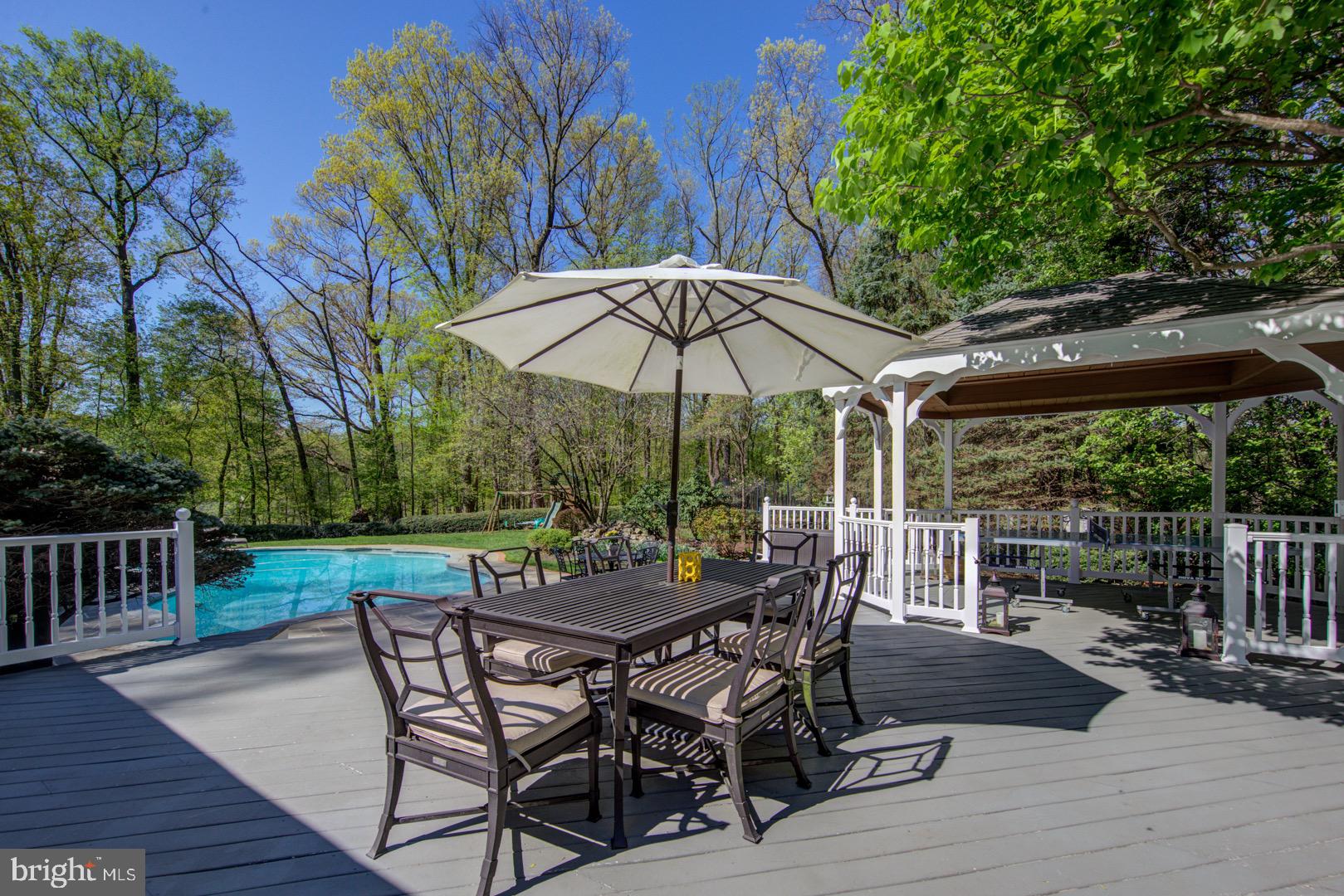 125 Graham Way Devon, PA 19333 - Photo 43 of 69 DECK OVERLOOKING POOL
