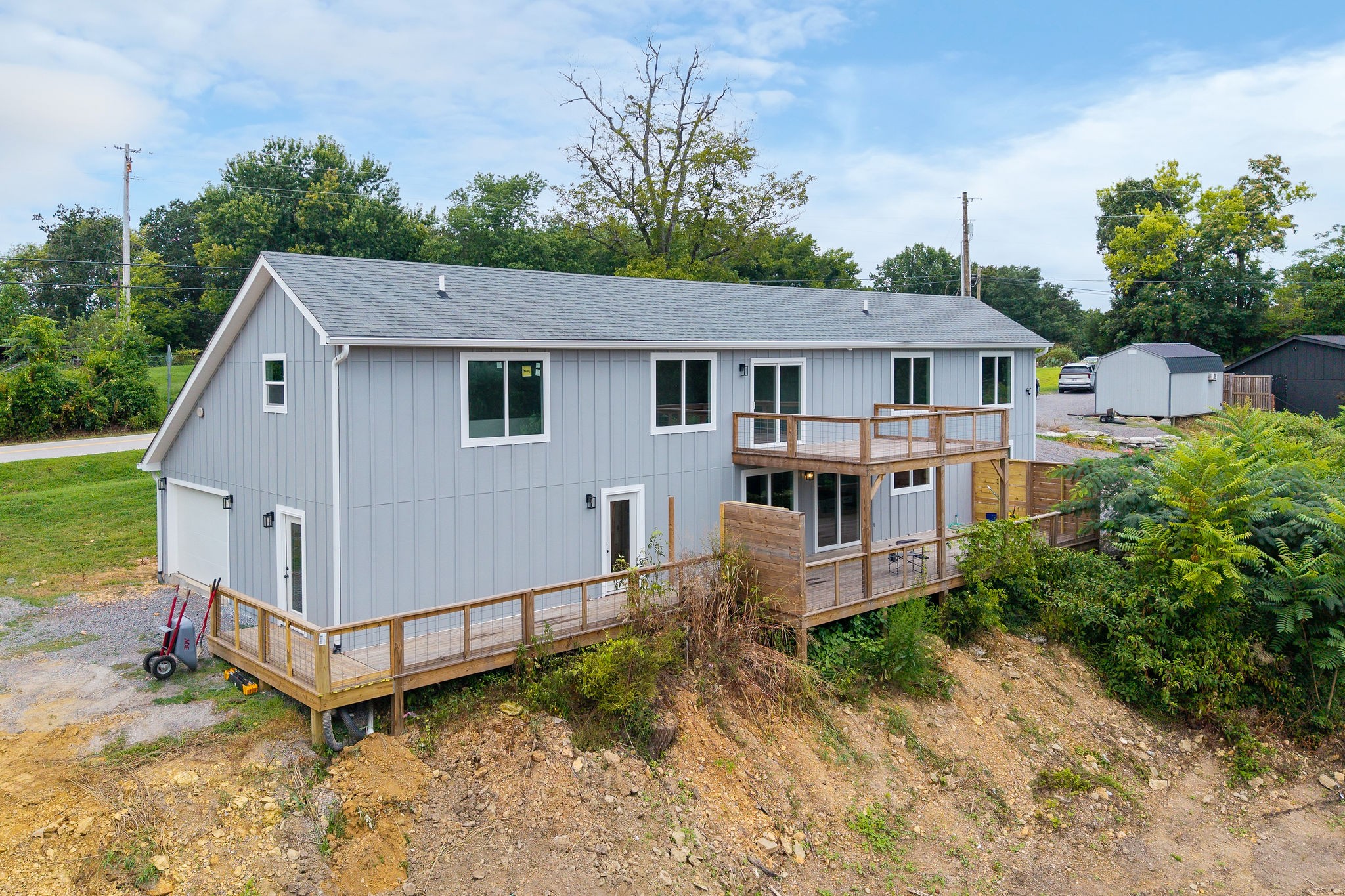 1124 Dale Ridge Road Dowelltown, TN 37059 - Photo 39 of 69 a view of a house with a yard and large tree