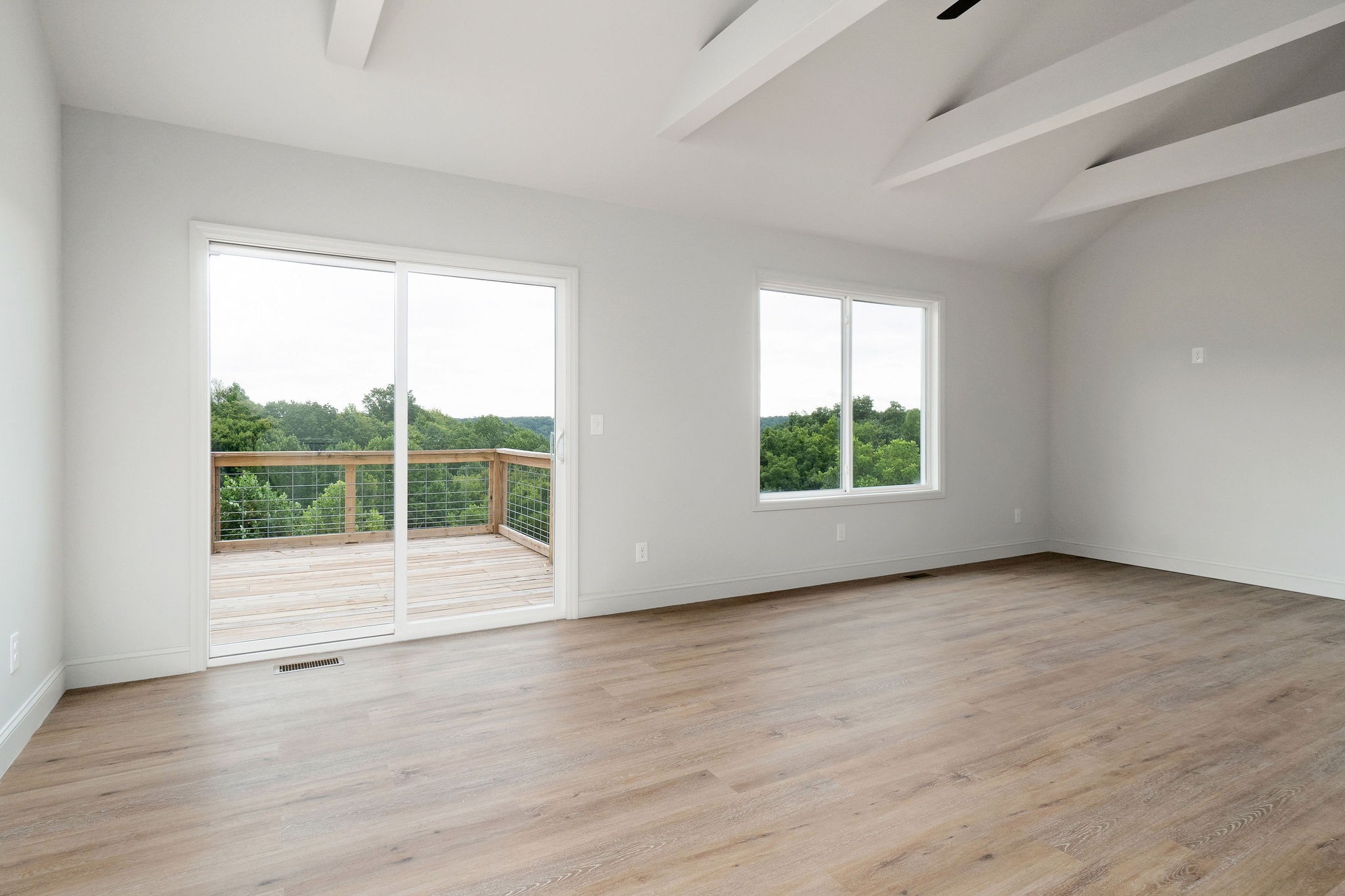 1124 Dale Ridge Road Dowelltown, TN 37059 - Photo 45 of 69 an empty room with wooden floor and windows