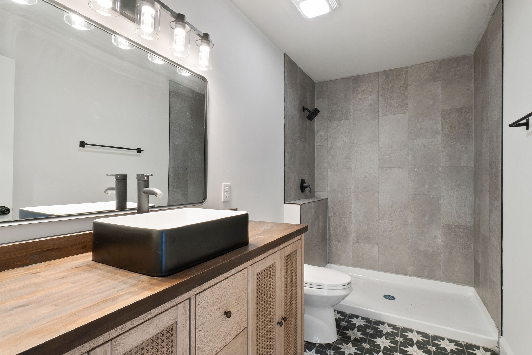 1124 Dale Ridge Road Dowelltown, TN 37059 - Photo 47 of 69 a bathroom with a double vanity sink toilet and shower