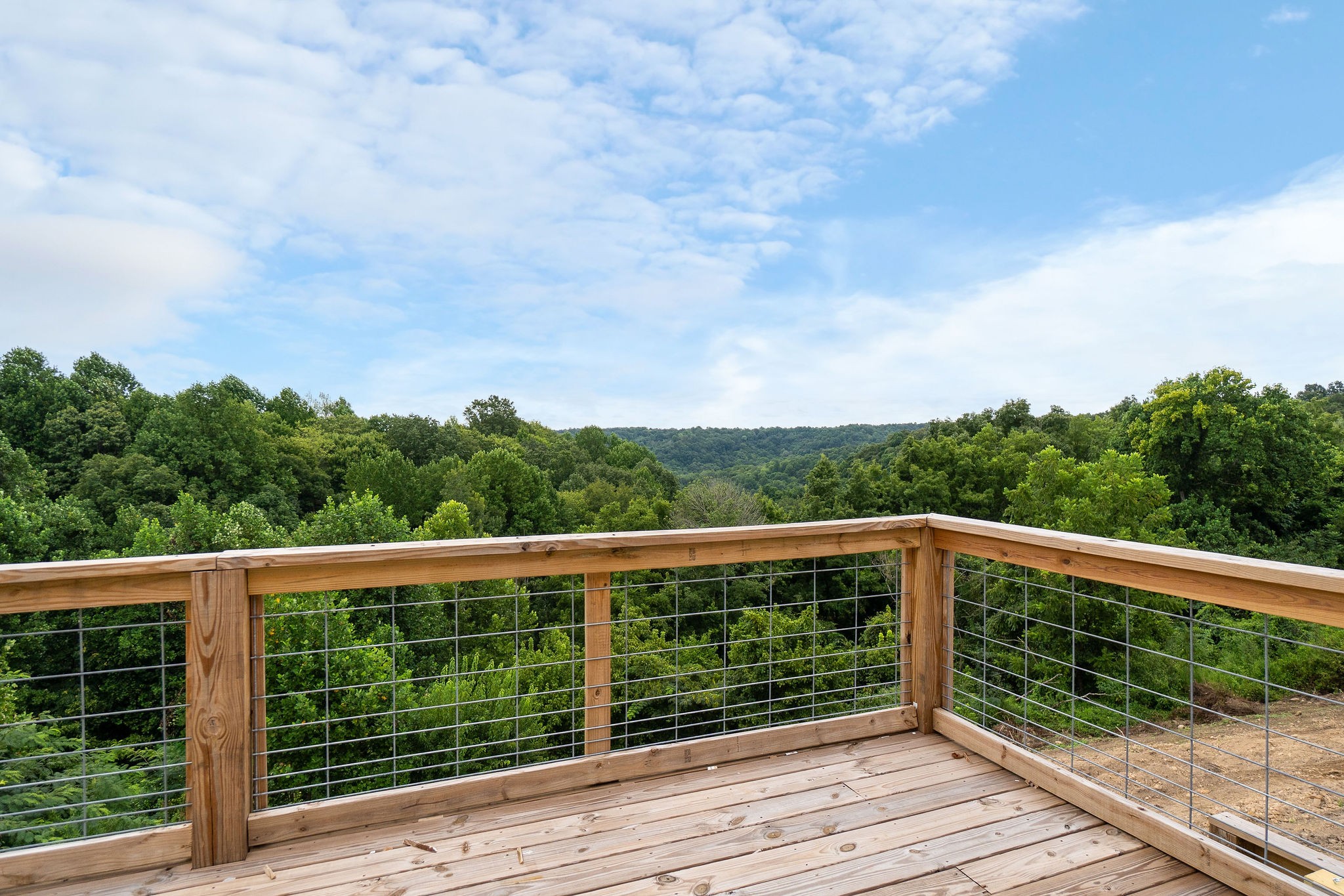 1124 Dale Ridge Road Dowelltown, TN 37059 - Photo 54 of 69 a view of a wooden deck next to a yard
