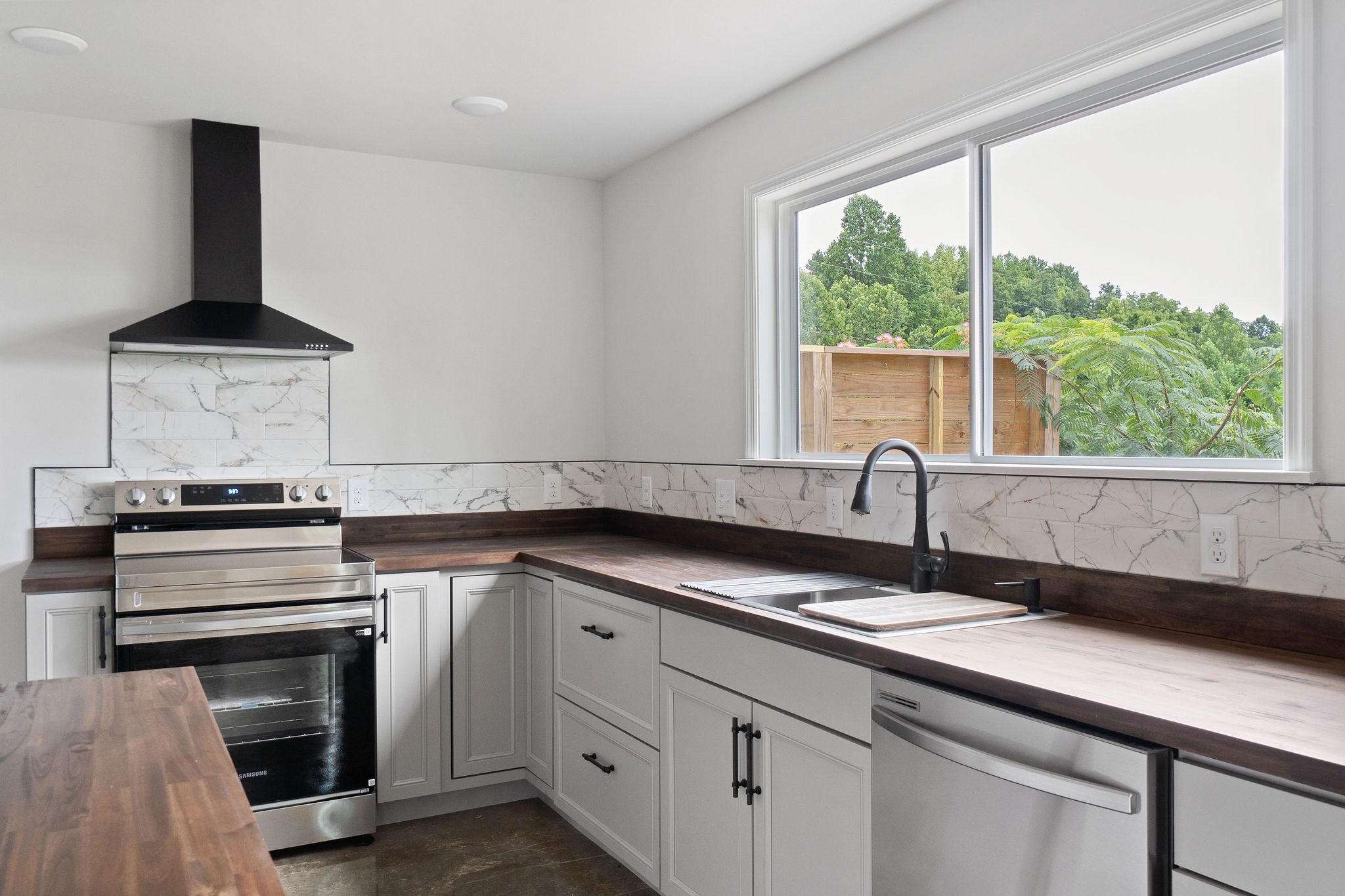 1124 Dale Ridge Road Dowelltown, TN 37059 - Photo 59 of 69 a kitchen with a sink stove and cabinets