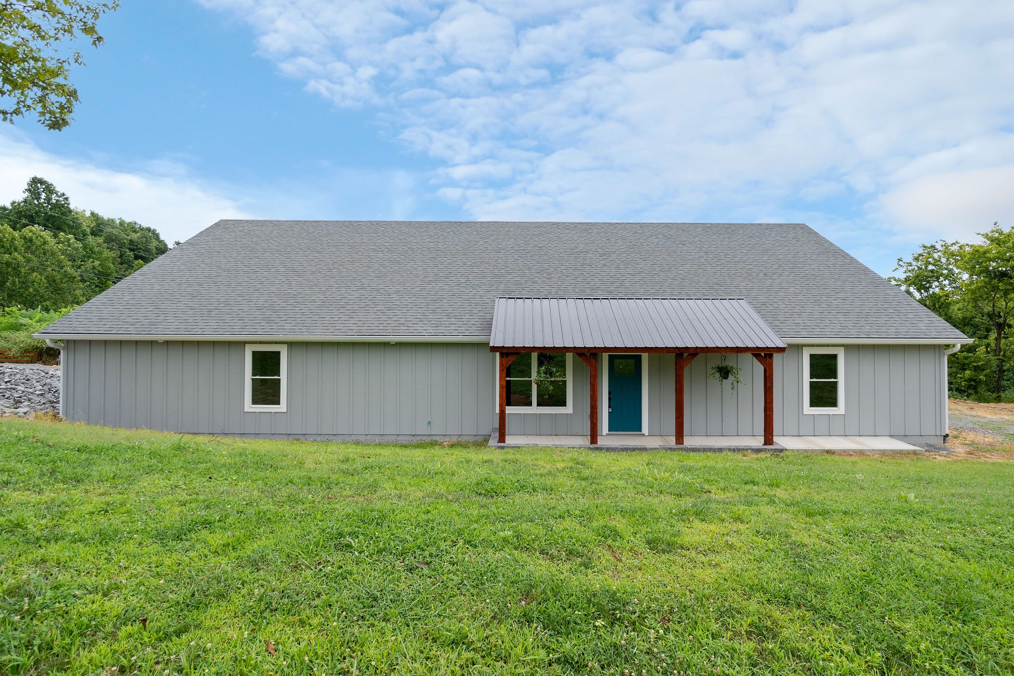 1124 Dale Ridge Road Dowelltown, TN 37059 - Photo 61 of 69 a front view of house with yard and green space