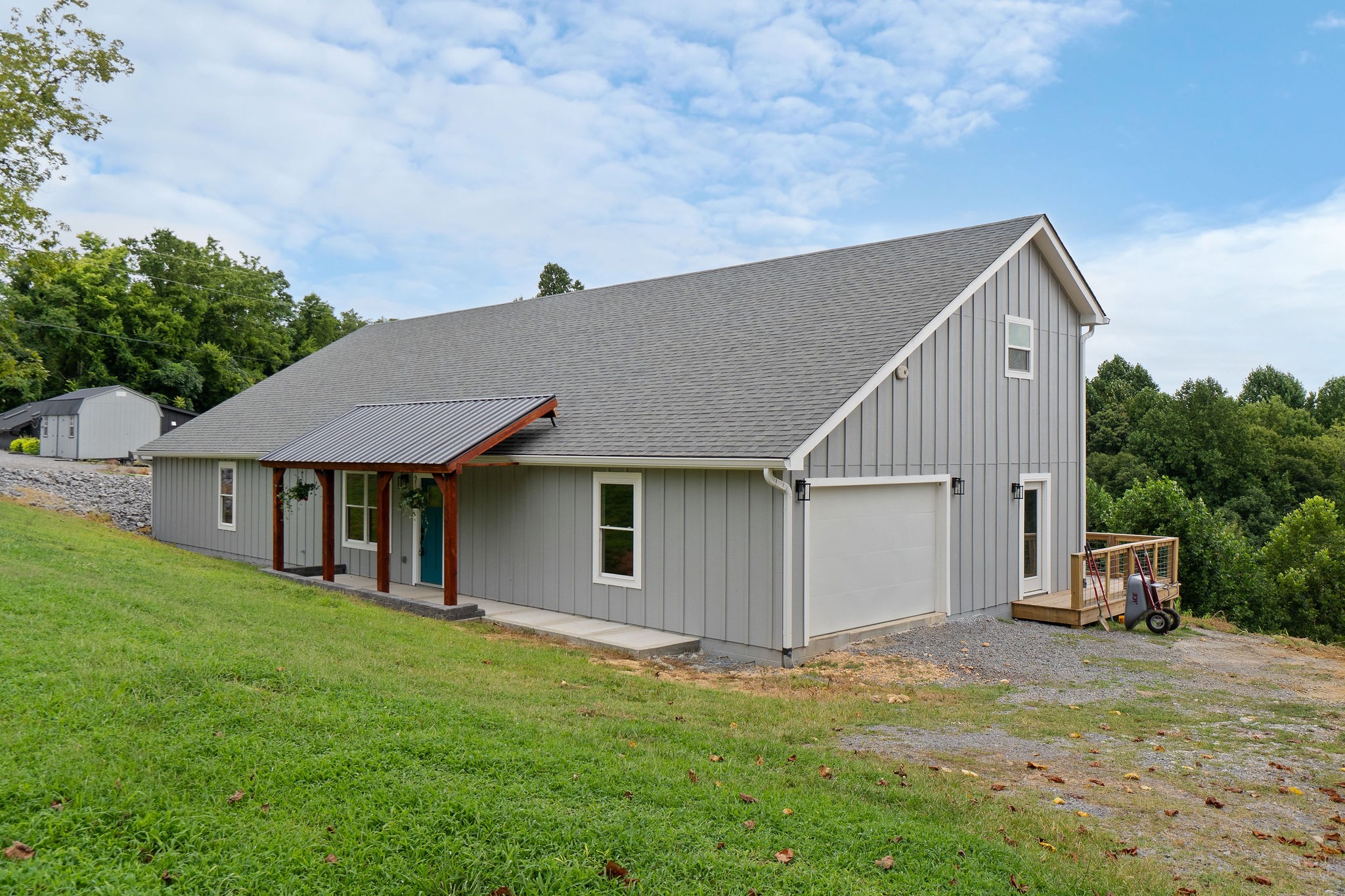 1124 Dale Ridge Road Dowelltown, TN 37059 - Photo 62 of 69 a backyard of a house with table and chairs