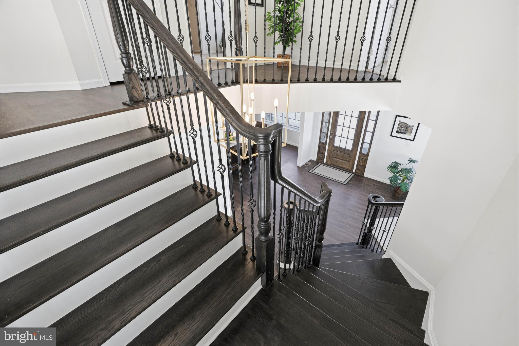 454 East Delp Road Lancaster, PA 17601 - Photo 31 of 78 a view of staircase with wooden floor and a rug