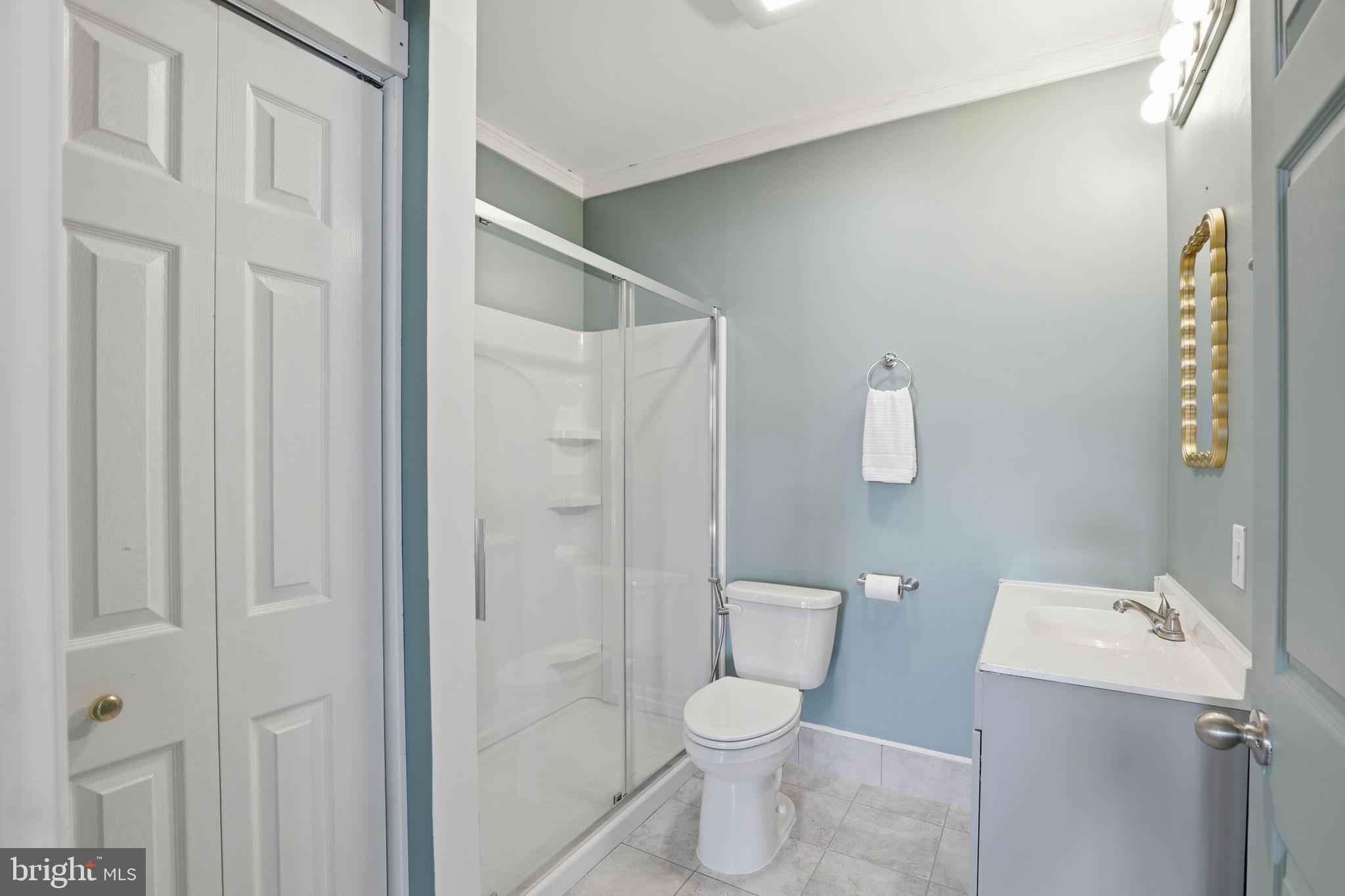 454 East Delp Road Lancaster, PA 17601 - Photo 61 of 78 a white toilet sitting next to a bathroom sink