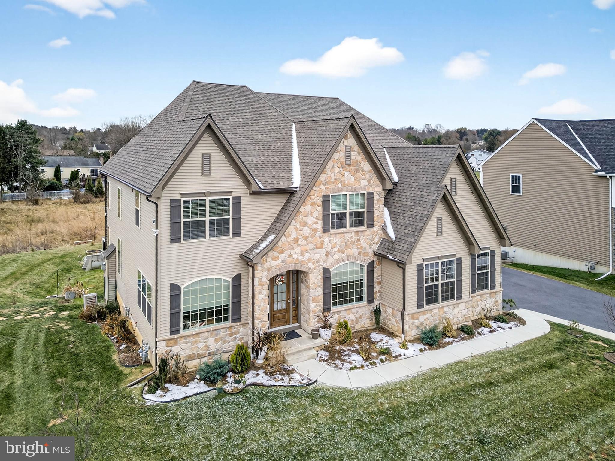 454 East Delp Road Lancaster, PA 17601 - Photo 62 of 78 a view of a white house with a yard patio and couches