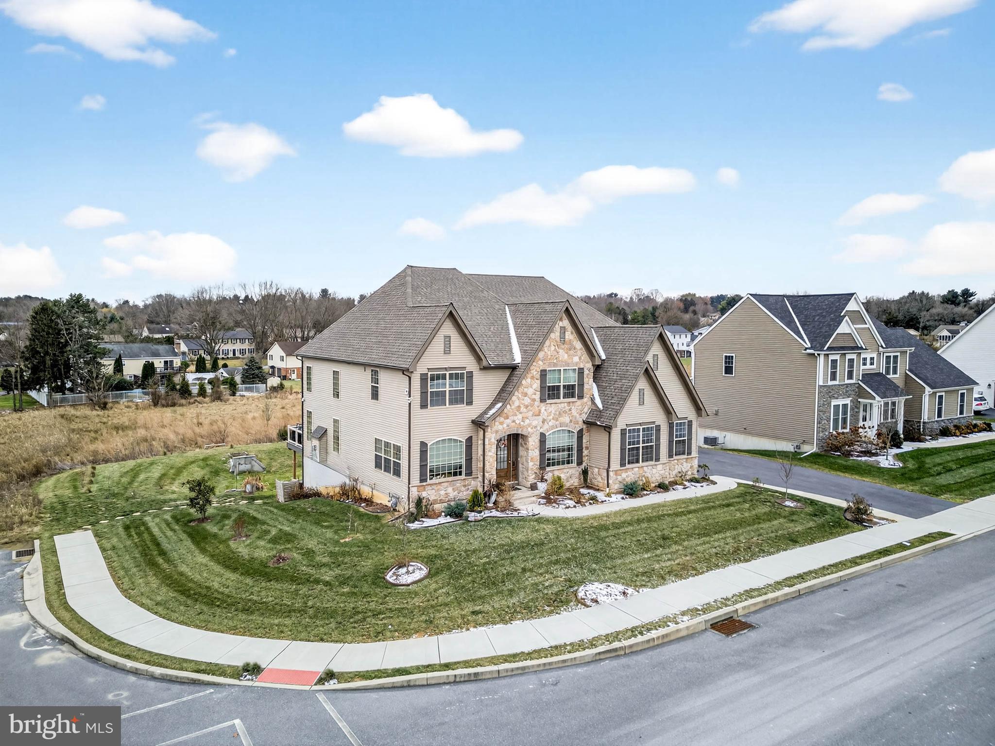 454 East Delp Road Lancaster, PA 17601 - Photo 65 of 78 a view of a white house with a big yard and large tree