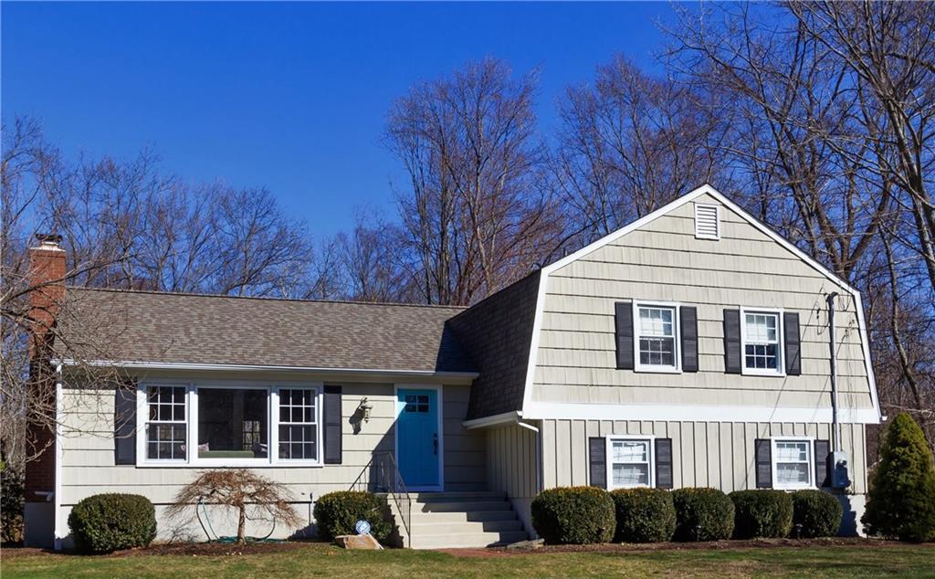 250 Mountain Laurel Road Fairfield, CT 06824 - Photo 1 of 1 a view of a house with a yard