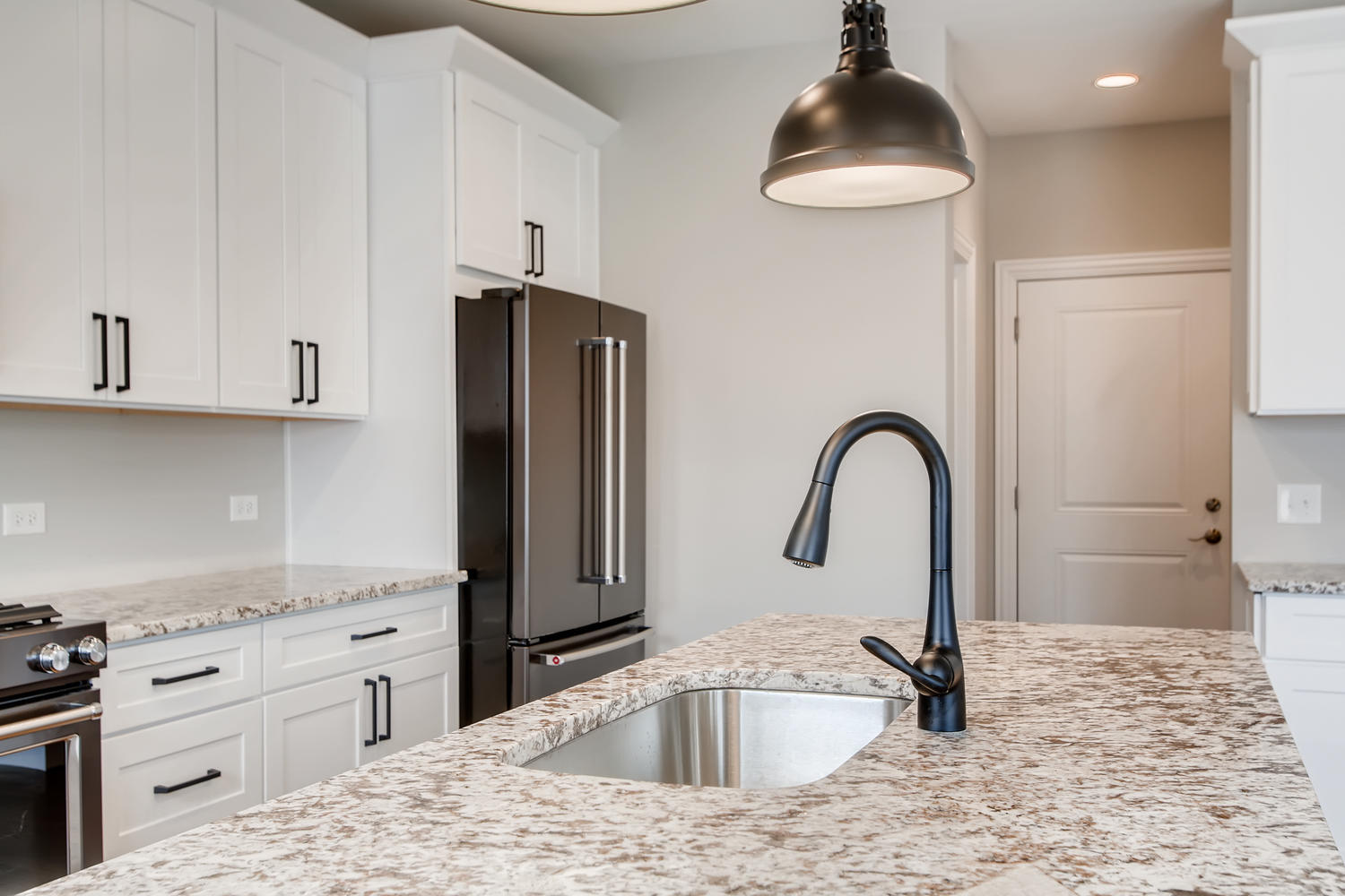 384 Woodland Chase Lane Vernon Hills, IL 60061 - Photo 5 of 16 a kitchen with stainless steel appliances granite countertop a sink a stove and refrigerator