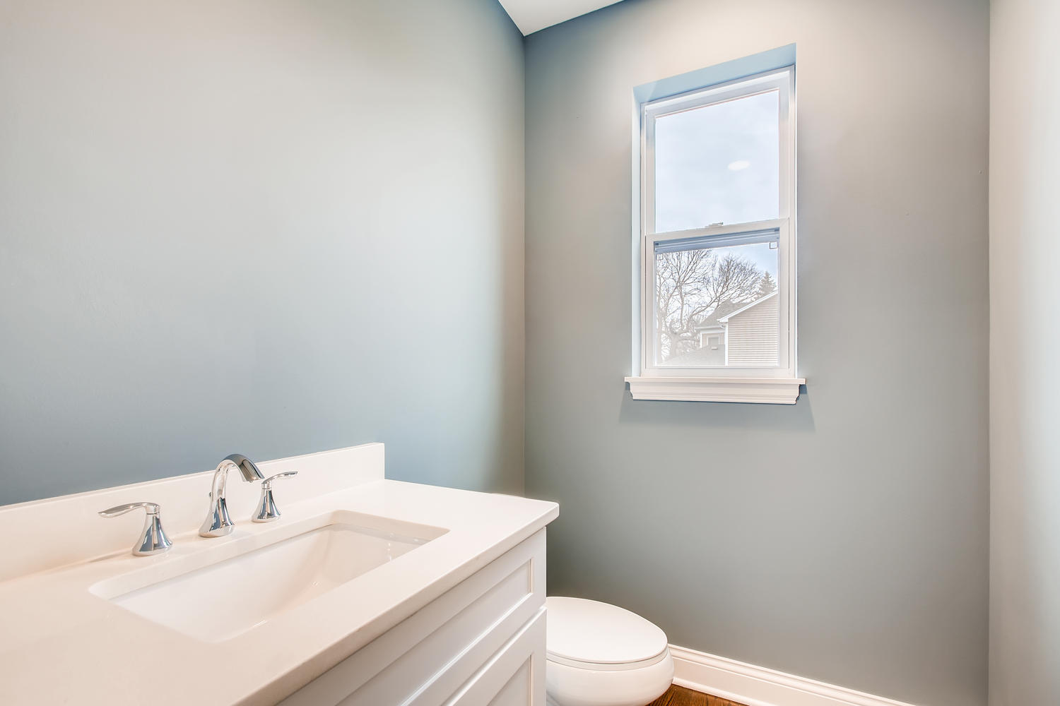 384 Woodland Chase Lane Vernon Hills, IL 60061 - Photo 7 of 16 a white toilet sitting next to a bathroom sink