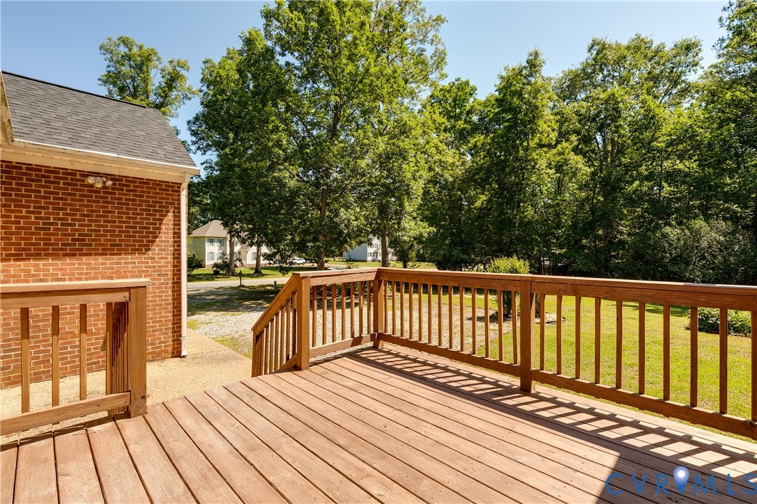 6701 Caboose Lane Sandston, VA 23150 - Photo 21 of 28 Newer wooden deck (2020) overlooking expansive bac