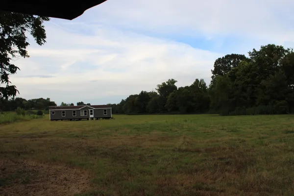 a view of outdoor space and yard