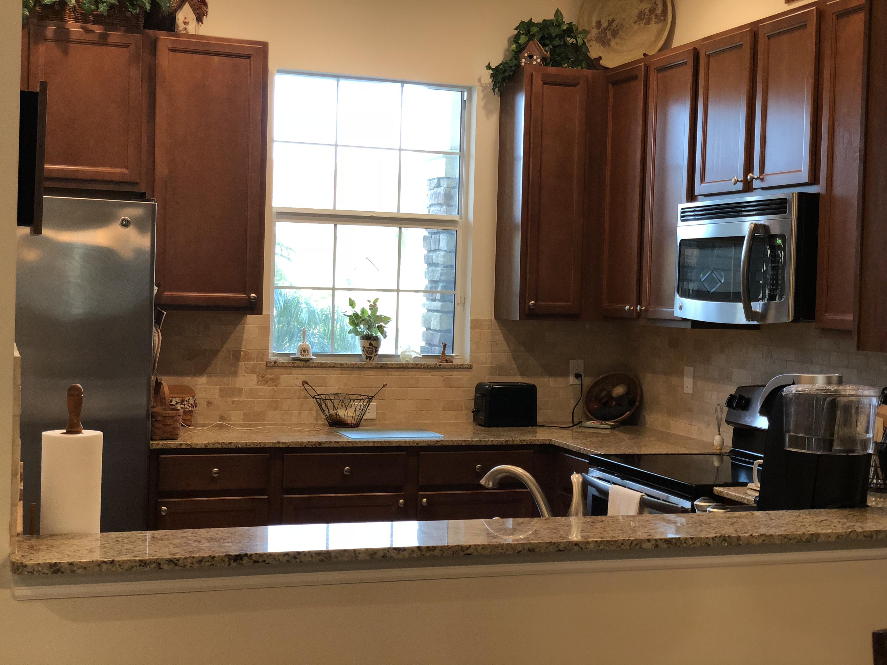 10263 Southwest Reggiani Road Port St. Lucie, FL 34986 - Photo 4 of 22 E89A20F9-441D-49C2-8987-119F894D50BA