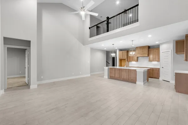 a view of a kitchen and an entryway