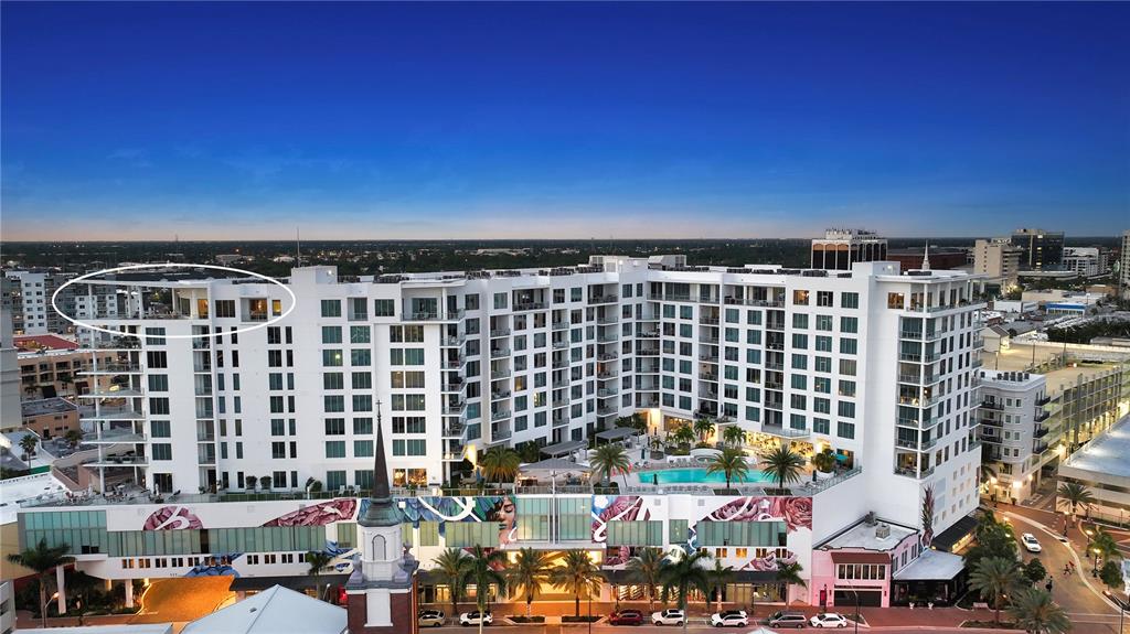 111 South Pineapple Avenue, Unit 1210 Sarasota, FL 34236 - Photo 2 of 54 a view of building with lot of windows