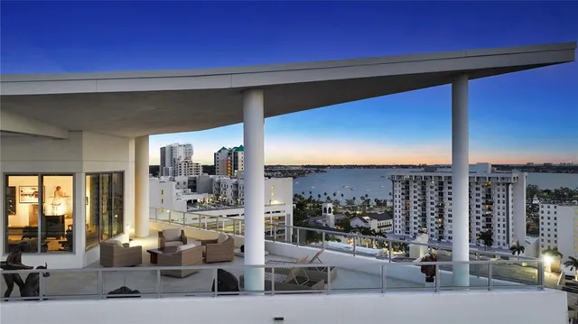 a view of a balcony with city view