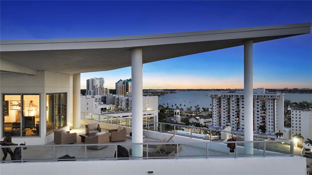 111 South Pineapple Avenue, Unit 1210 Sarasota, FL 34236 - Photo 4 of 54 a view of a balcony with city view