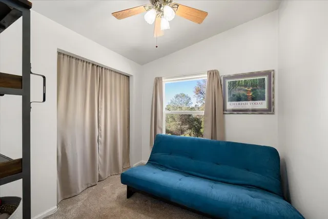 a bathroom with a sink toilet and a mirror