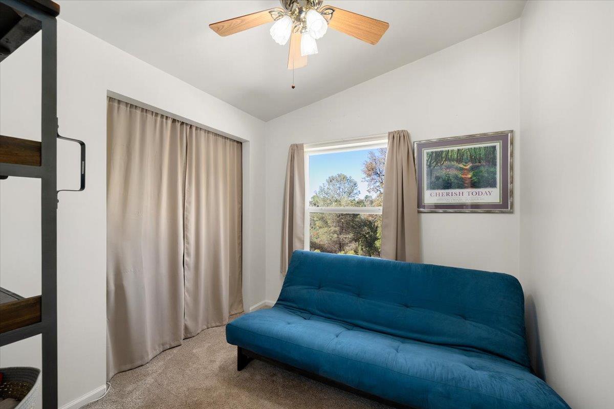 7155 Stewart Mine Road Placerville, CA 95667 - Photo 21 of 68 a living room with furniture and a window