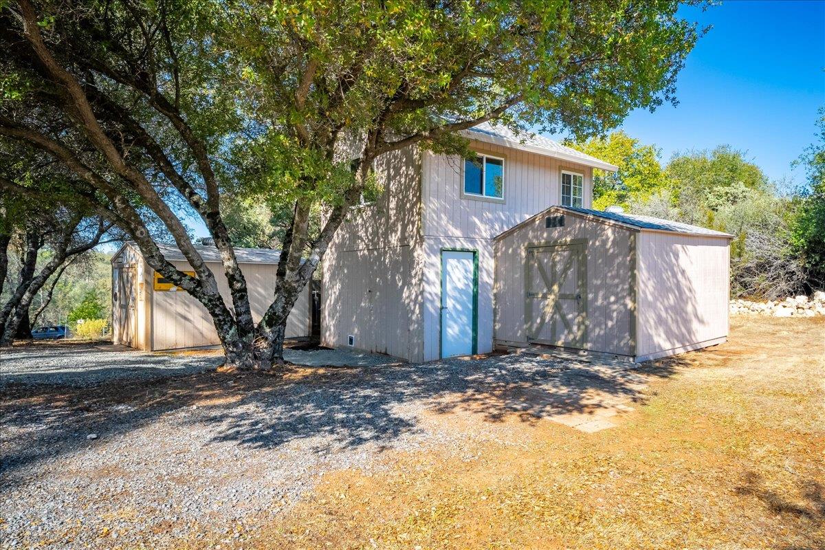 7155 Stewart Mine Road Placerville, CA 95667 - Photo 27 of 68 a view of a house with a yard