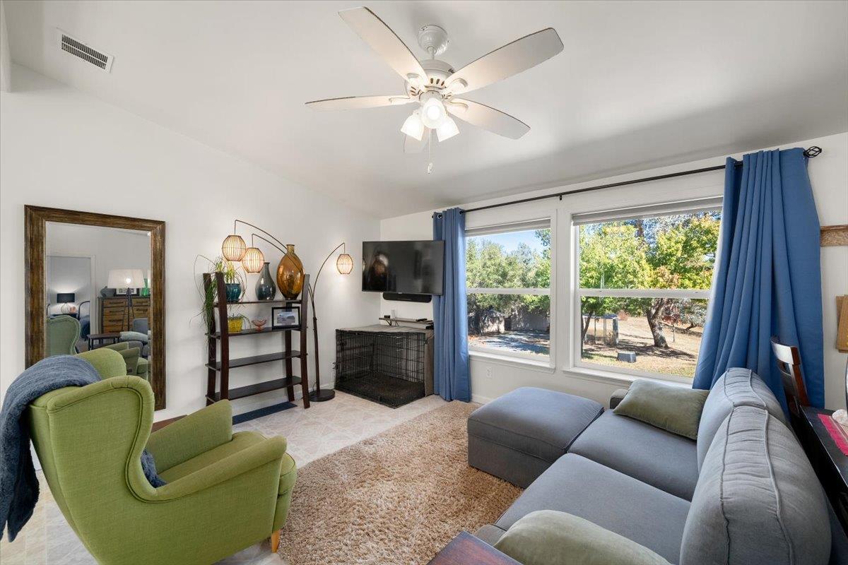 7155 Stewart Mine Road Placerville, CA 95667 - Photo 8 of 68 a living room with furniture and a large window