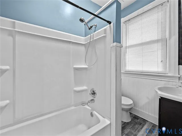 a view of a porch with wooden floor