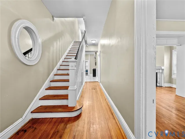 a view of entryway with wooden floor