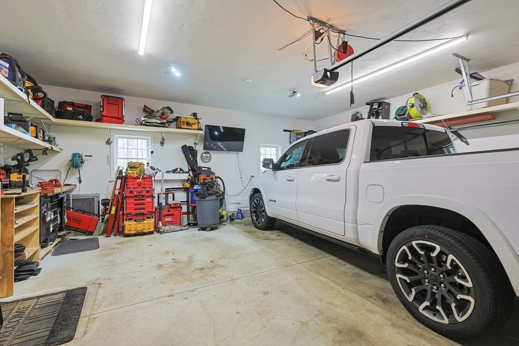 24 Reservoir Road Pembroke, MA 02359 - Photo 36 of 42 a utility room with toys and other items