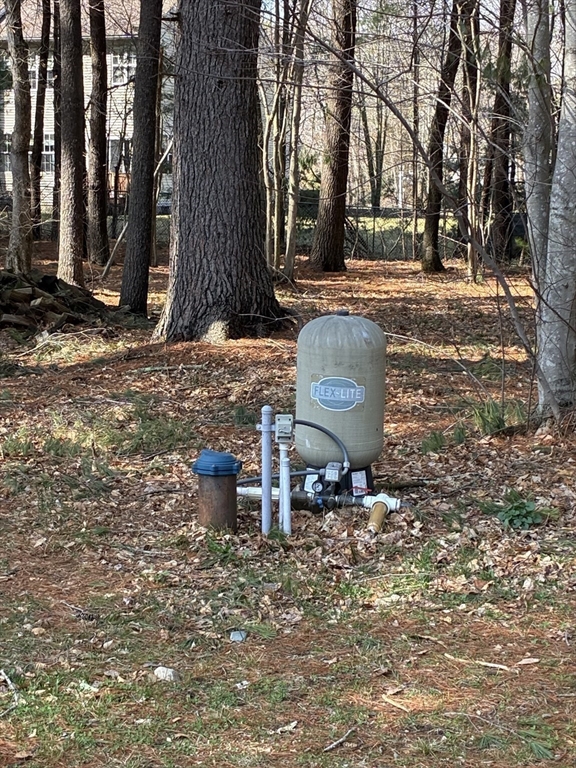 24 Reservoir Road Pembroke, MA 02359 - Photo 39 of 42 a view of a outdoor space with fountain