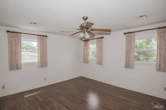 a bathroom with a sink vanity and a mirror
