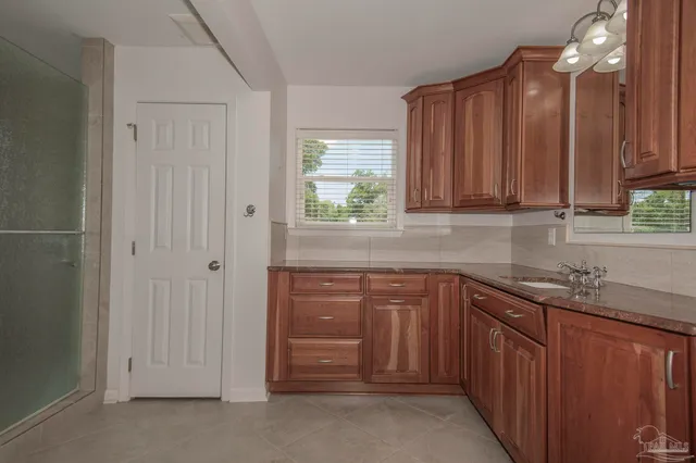 a view of a chandelier fan in a room