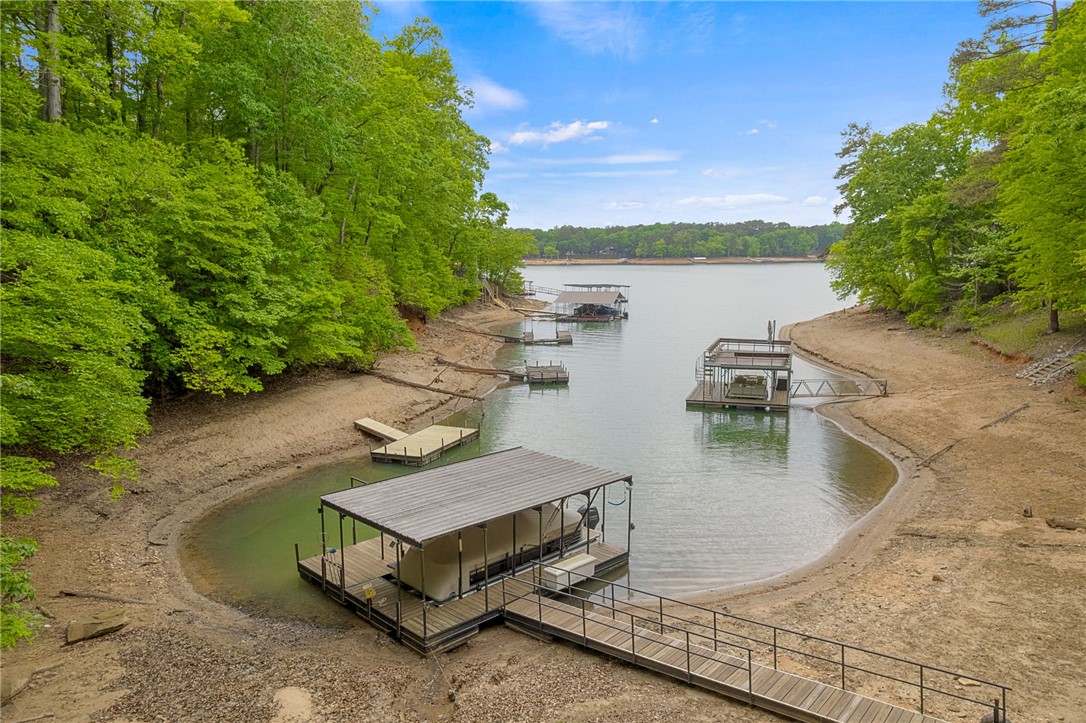 5 Shelor Ferry Road Fair Play, SC 29643 - Photo 4 of 17 Beautiful cove location with multiple docks and calm water, offering a tucked-away lake setting.