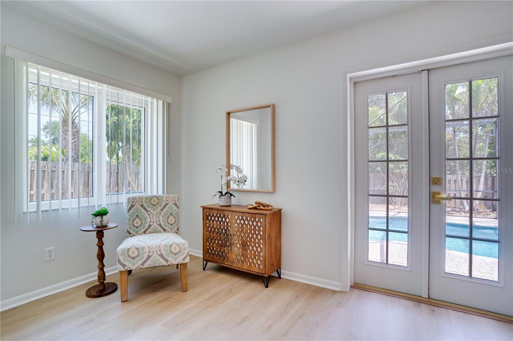 5135 101st Street North St. Petersburg, FL 33708 - Photo 20 of 46 a living room with furniture and wooden floor