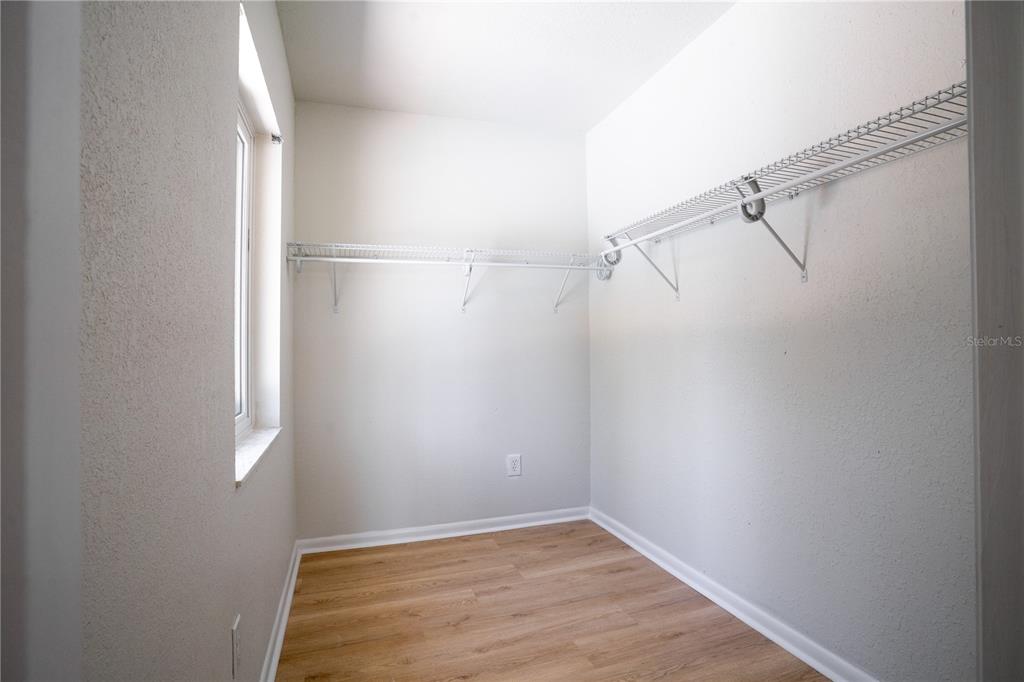 5135 101st Street North St. Petersburg, FL 33708 - Photo 26 of 46 a view of small space with racks on the wall