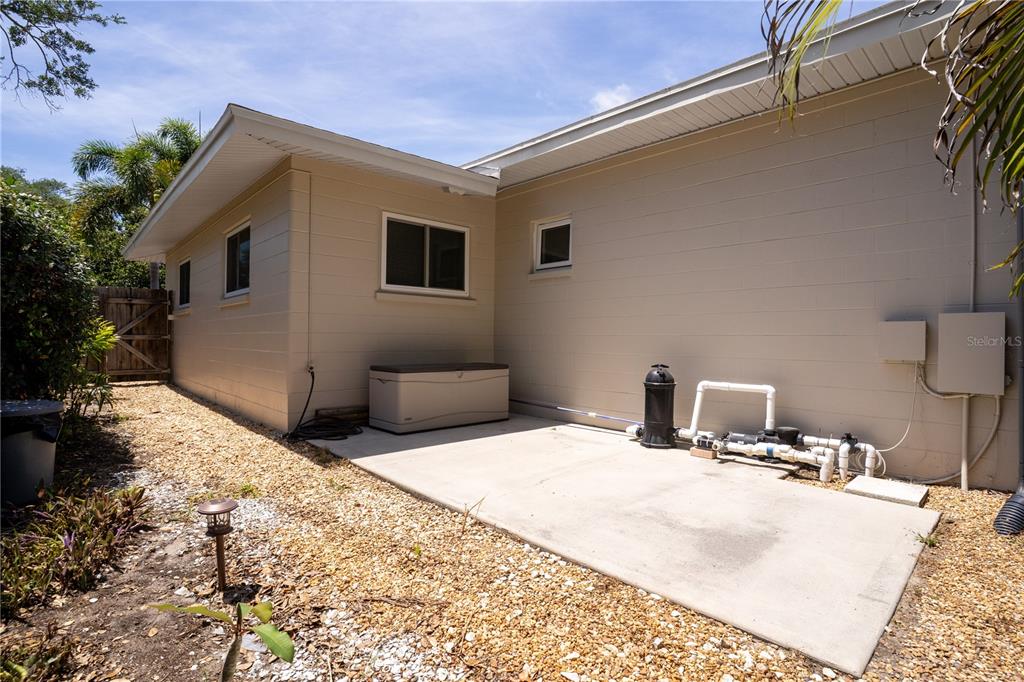 5135 101st Street North St. Petersburg, FL 33708 - Photo 35 of 46 a bed room with a bed