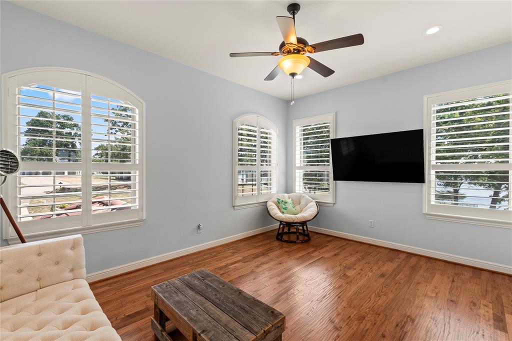 204 Pinnacle Club Place Mabank, TX 75156 - Photo 26 of 40 a living room with furniture and a flat screen tv