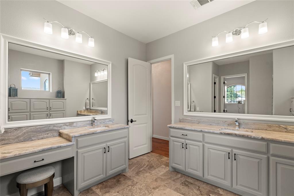 204 Pinnacle Club Place Mabank, TX 75156 - Photo 30 of 40 a bathroom with a granite countertop sink double and mirror