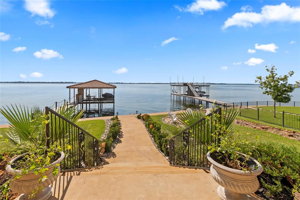 204 Pinnacle Club Place Mabank, TX 75156 - Photo 36 of 40 a view of a swimming pool with a patio