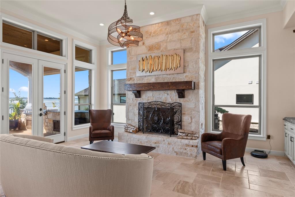 204 Pinnacle Club Place Mabank, TX 75156 - Photo 9 of 40 a view of a livingroom with furniture window and a fireplace