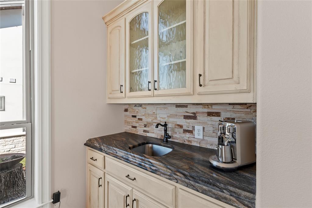 204 Pinnacle Club Place Mabank, TX 75156 - Photo 10 of 40 a kitchen with a sink and cabinets