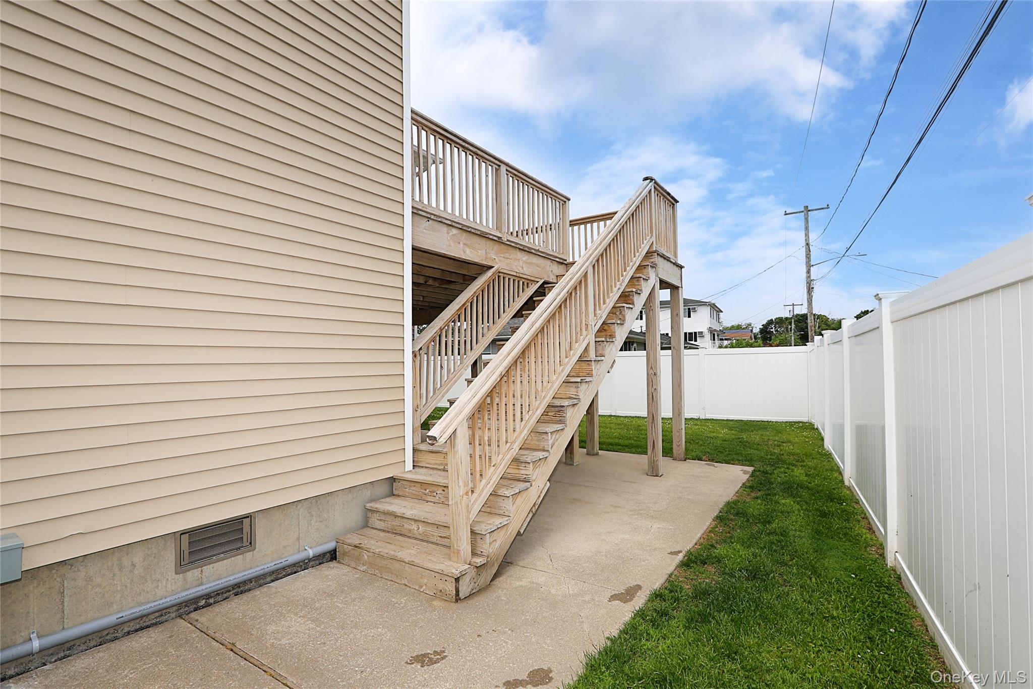 370 Rider Avenue Patchogue, NY 11772 - Photo 32 of 40 Backyard Deck Access